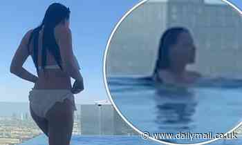 Jess Wright wears frilly white bikini in Dubai penthouse suite