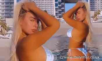 Love Island's Ellie Brown puts on a cheeky display in skimpy string bikini