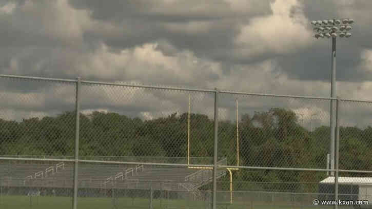 Florida school district investigating claims that cheerleader was forced to kneel during anthem