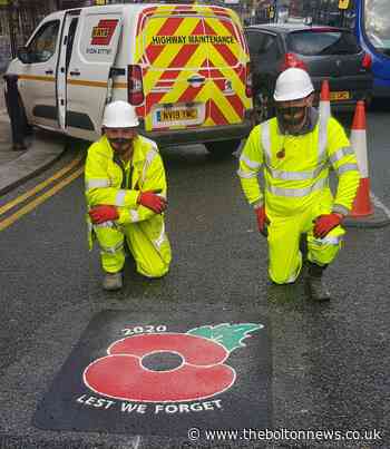 Remembrance Day marked with painted poppies on Bolton's roads