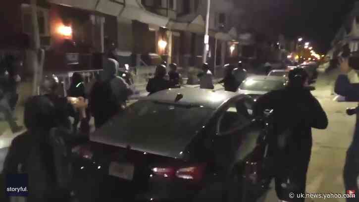 Philadelphia Police Retreat as Demonstrators Hurl Objects at Them