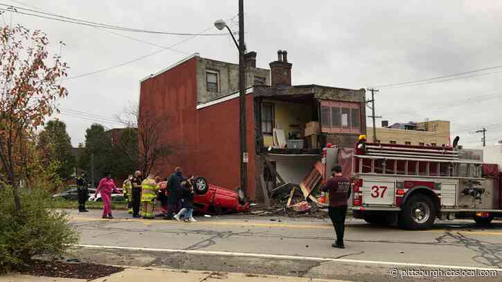 Man Hospitalized After Car Smashes Into House, Flips Over