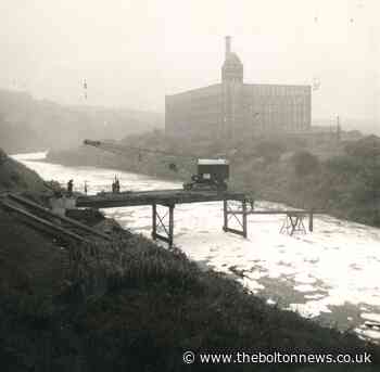 Bridge over river of foam at Prestolee was a risky business