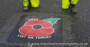 Poppy signs are being painted on roads across Bolton to mark Remembrance Sunday - Manchester Evening News