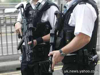 Two armed Metropolitan police officers charged in shooting of suspected robber