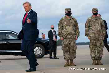 The Latest: Trump Visits Ft. Bragg Troops in North Carolina