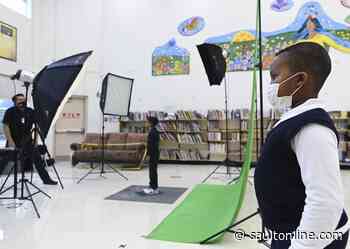 Sanitizer, masks and smiles mark an unusual school photo day for a COVID-19 year