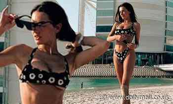 Love Island's Amber Davies flaunts toned figure in a floral bikini during sun-soaked trip to Dubai
