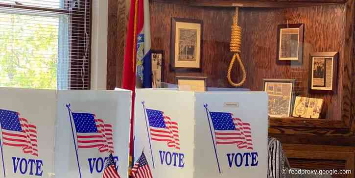 A hangman's noose displayed in a polling station in Missouri covered up following complaints of voter intimidation towards Black voters