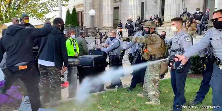 Police officers in North Carolina pepper-sprayed demonstrators marching to the polls to vote