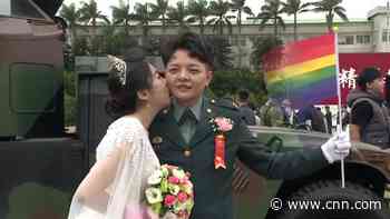Two gay couples in Taiwan make history in military wedding