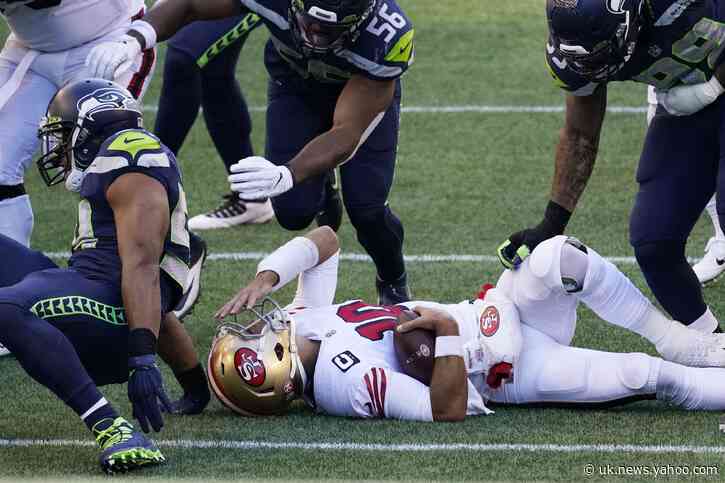 AP source: Garoppolo, Kittle out indefinitely for 49ers