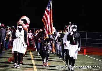 Peters investigates controversial band outfits at football game with Woodland Hills