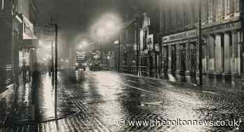 Different days as lights reflected in cobbles of Deansgate