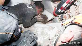 Turkish rescuers pull girl from rubble 4 days after quake
