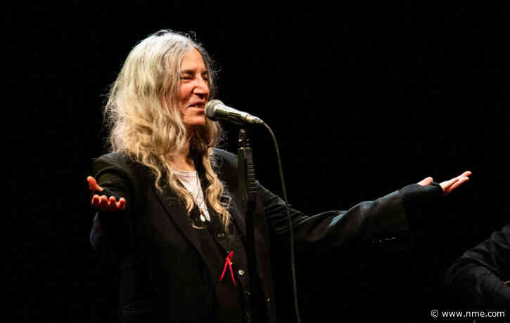 Patti Smith and Lenny Kaye perform ‘People Have The Power’ for voters in New York