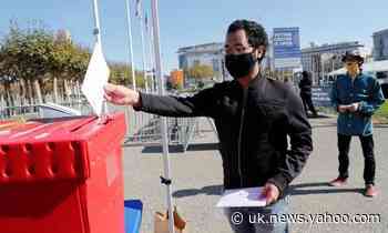 'Democracy is at stake': Americans cast their votes in momentous election