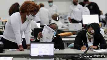 U.S. election unfolds smoothly, so far defying fears of disruption