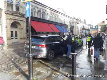 Man arrested in town centre after Market Place incident - The Bolton News