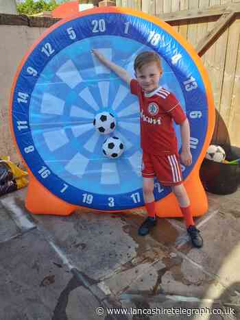 Footie mad lad in fundraising fun for Accrington care home residents