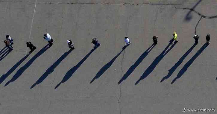 Record early vote leads to tranquil Election Day at polls