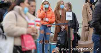Last-minute shoppers queue outside Bristol shops ahead of lockdown