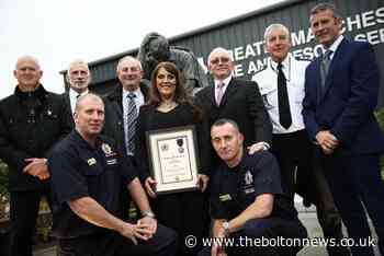 Emma Hughes presented with a Spirit of Fire Award for her work in her father's memory