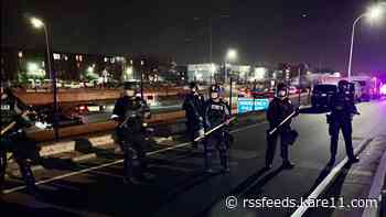Demonstrators march onto I-94 in Minneapolis in post-election protest