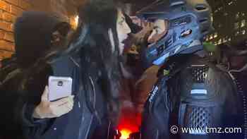 Woman Arrested for Spitting in Cop's Face Amid NYC Unrest, Riot in Portland