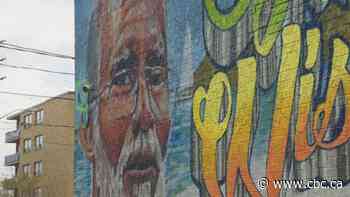 Toronto artist paints mural to honour barber and musician Jimmy Wisdom