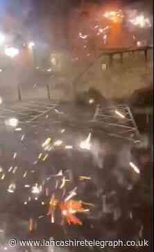 Disgusting video shows police officers attacked with fireworks by group of yobs