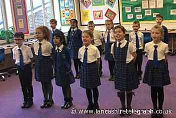 Students dedicate song to fallen war heroes