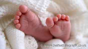 Family with 14 sons welcomes first baby girl into family
