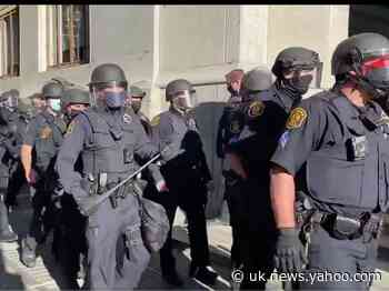 Riot police arrive at tense stand-off between opposing election protestors in Pittsburgh