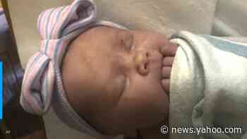 Michigan couple with 14 sons welcome their first daughter after nearly three decades