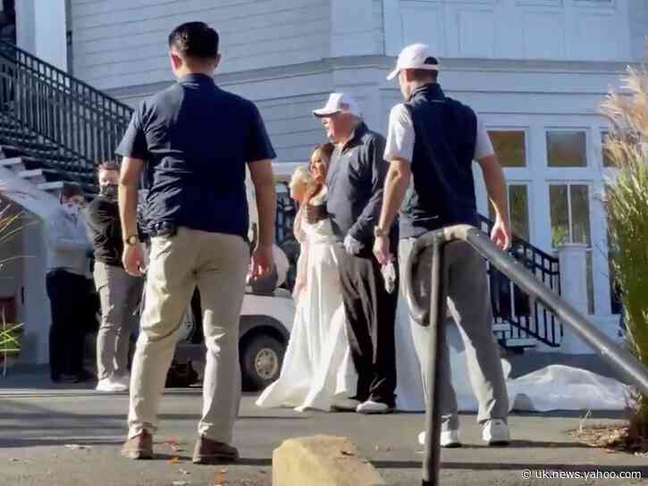 Donald  Trump poses with bride at golf course after losing election to Joe Biden