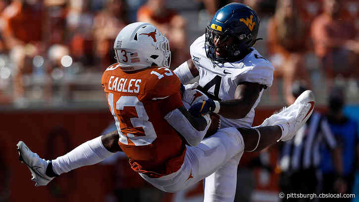 Texas Narrowly Holds Off WVU 17-13