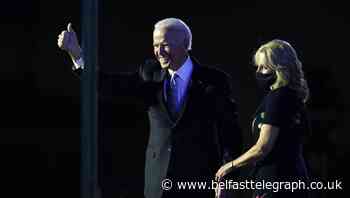 Biden urges unity and turns to business of transition