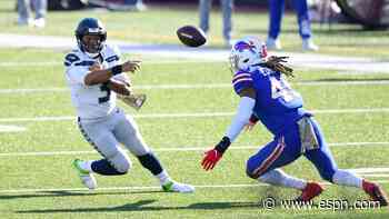 Russell Wilson hammered, Seahawks' defense gashed again in troubling loss