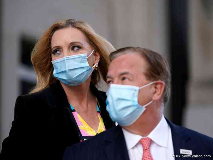 Couple who waved guns at St Louis protesters sue news photographer