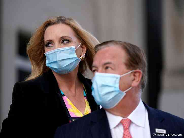 Couple who waved guns at St Louis protesters sue news photographer