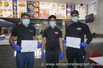 Takeaway staff at Freddy's presented with covid safety certificates