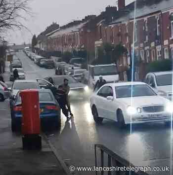 Two arrests over Blackburn Mercedes reversing car fracas
