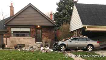 'Something out of a movie': Neighbours shocked after car crashes into home in Toronto’s east-end
