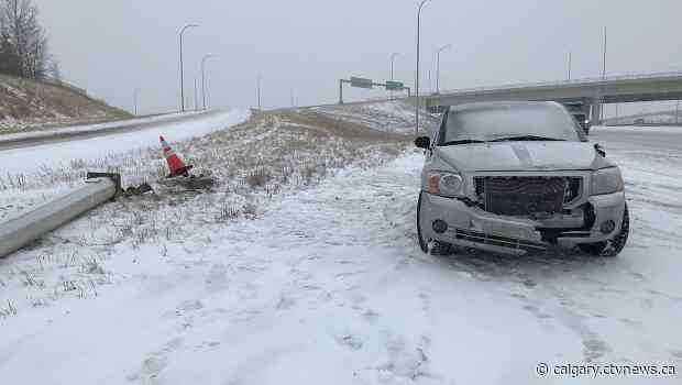Morning snowfall makes for slick conditions on Calgary roads