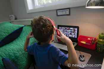 Schools increasingly return to online learning as Covid-19 spikes across the U.S.