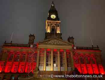 Bolton Town Hall lit up in Remembrance tribute to the fallen