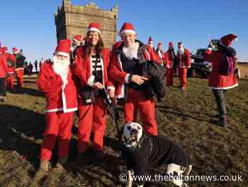 Bolton family hike the pike in red santa suits for charity