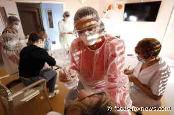 Europe hunkers down but also notes wins against virus surge