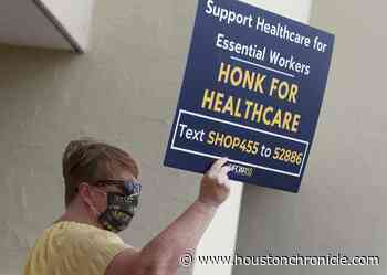 Kroger workers in Houston overwhelmingly favor strike, but talks continue - Houston Chronicle